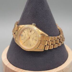 Vintage Oleg Cassini Gold Toned Watch